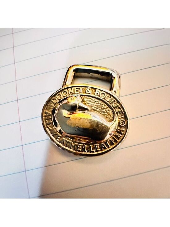 Dooney & Bourke Accessories - Dooney & Bourke Gold Duck Emblem